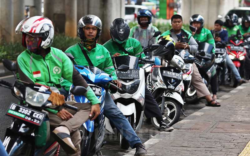 Dampak Konflik Antara Driver Gojek dan Ojek Pangkalan